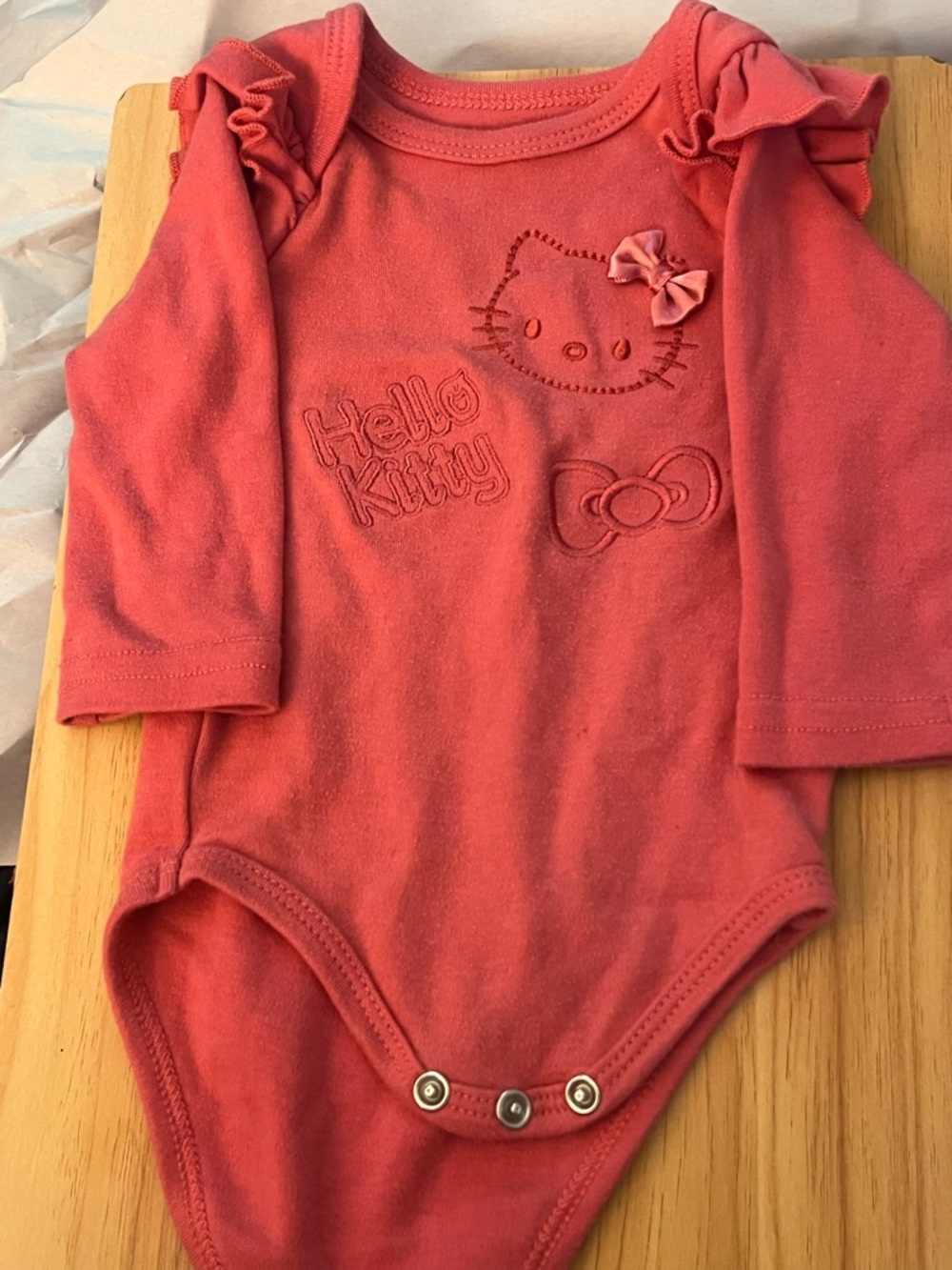 Hello Kitty Coral-Pink Long Sleeve Baby Bodysuit with Ruffle Shoulders